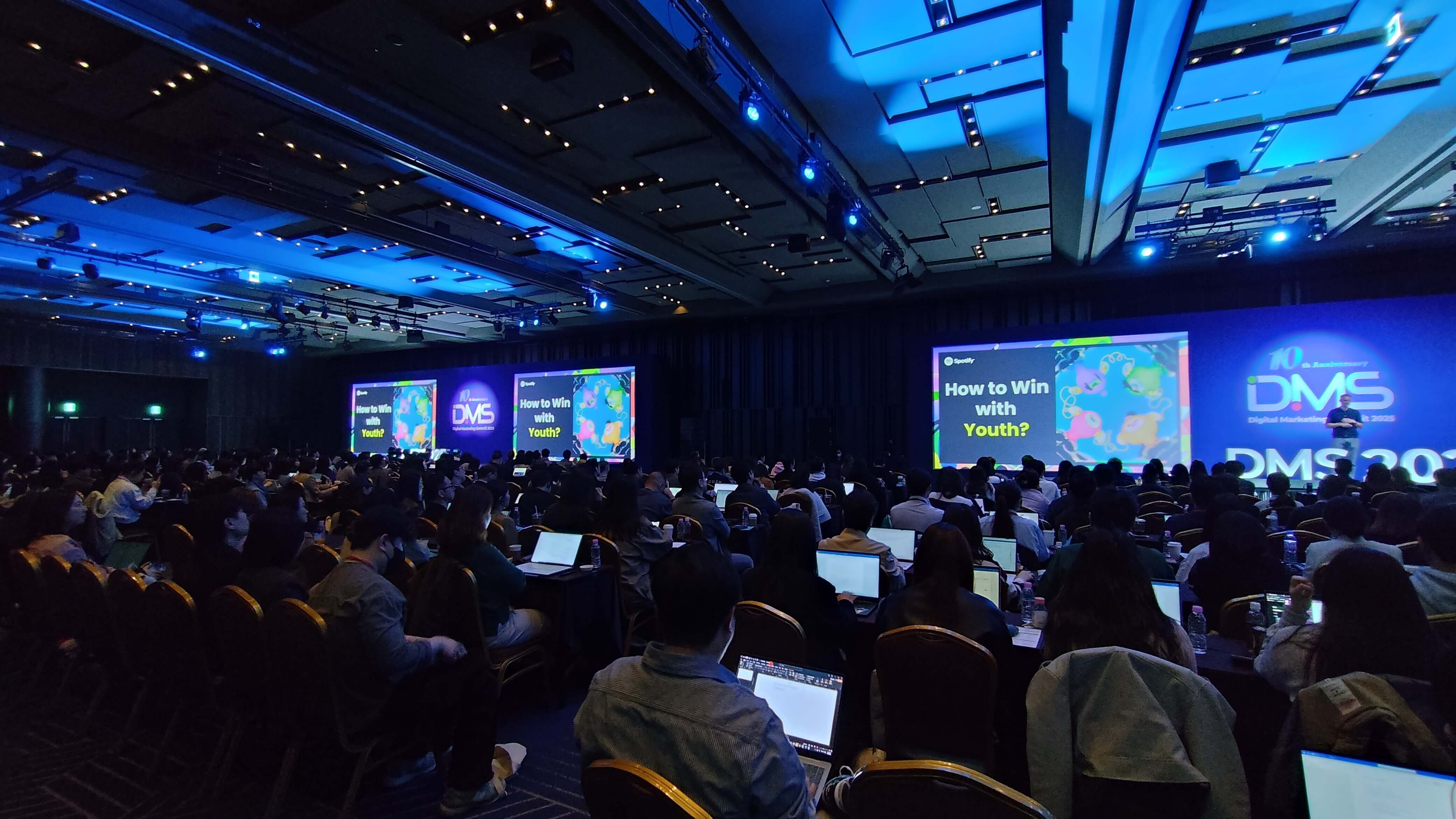 A packed hall listens to Spotify’s keynote on youth engagement at Digital Marketing Summit 2025, highlighting major trends in audience targeting and content strategy.